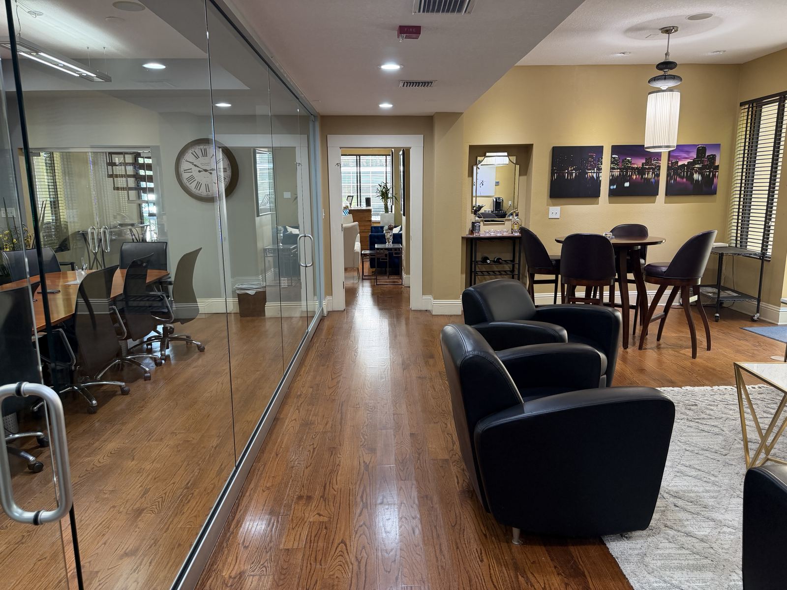 First-floor community lounge beside the glass conference room at BoomerangOffice, 350 E. Pine Street