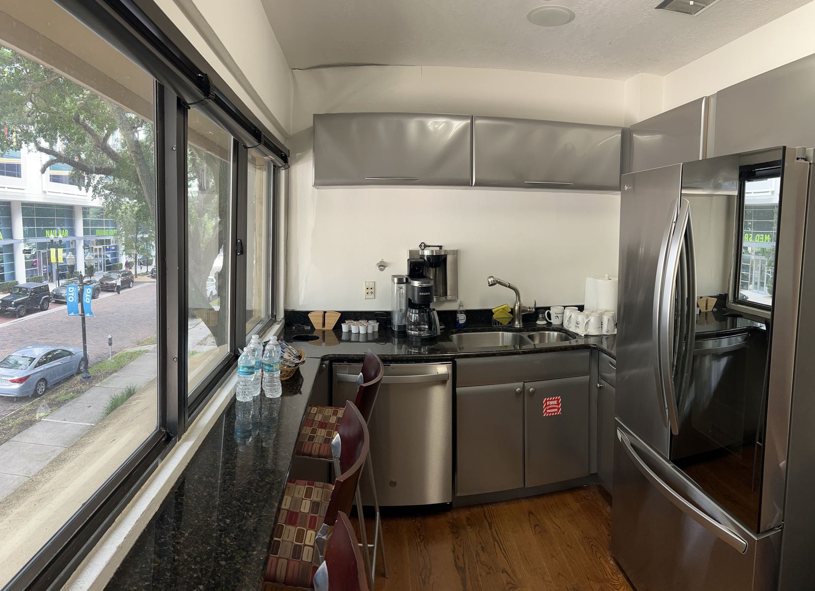 Kitchen with coffee station and filtered water at BoomerangOffice