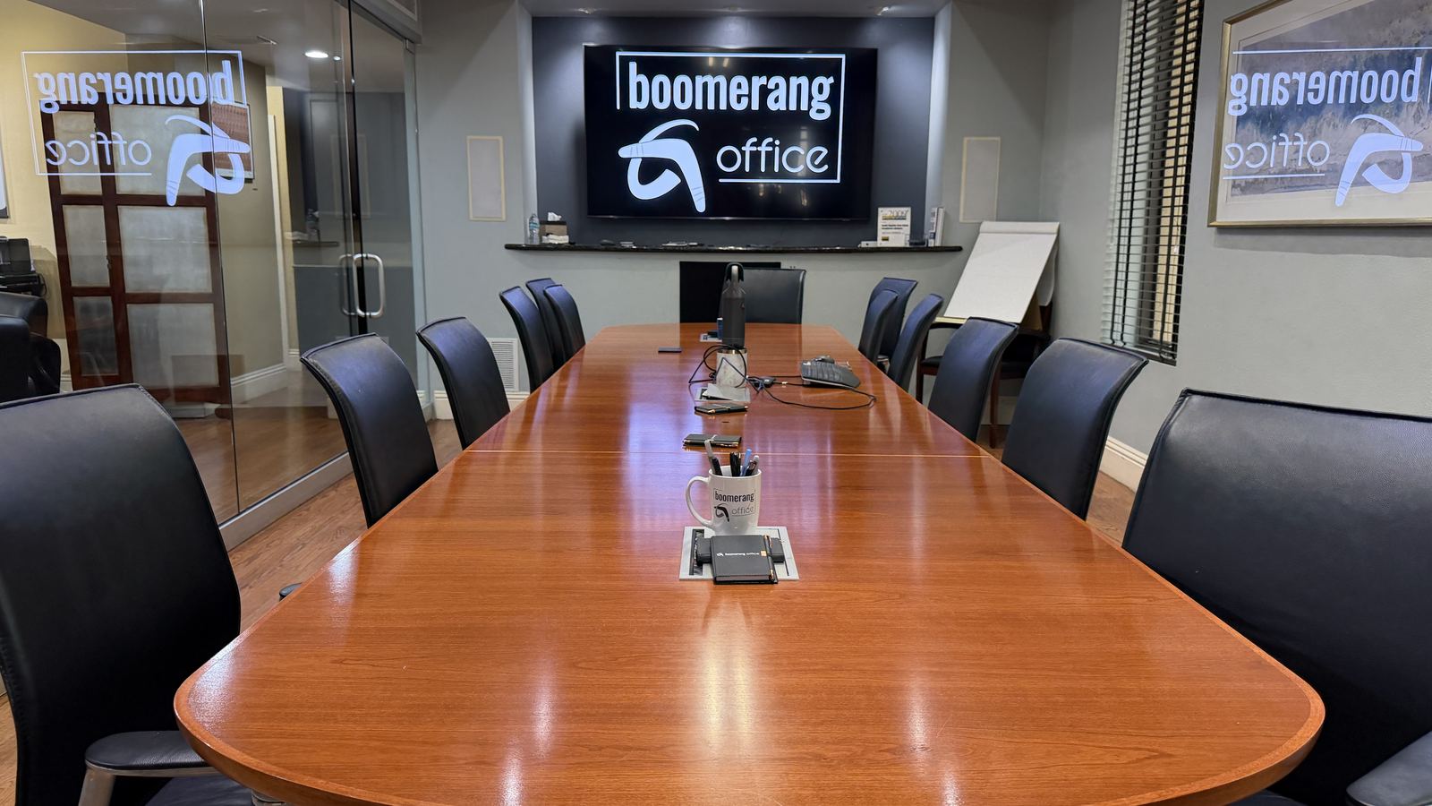 Main conference room with branded display at BoomerangOffice, 350 E. Pine Street, downtown Orlando