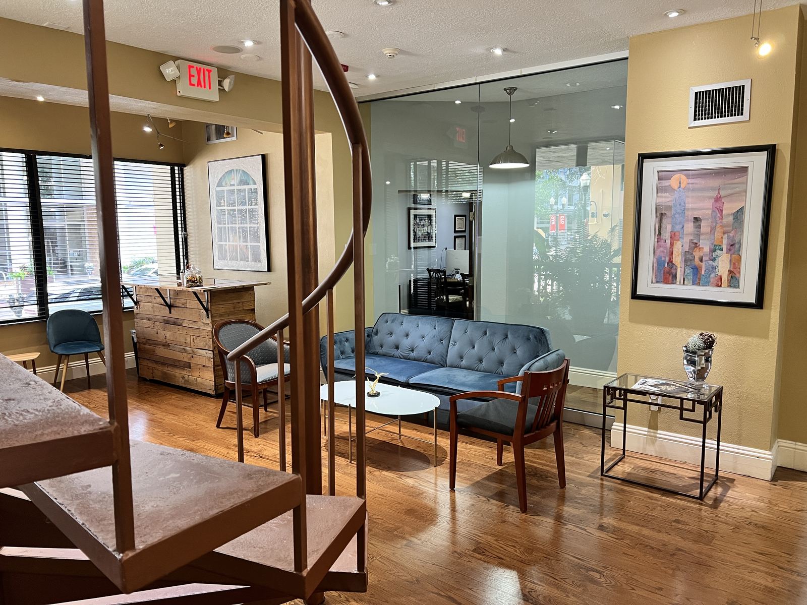 Signature spiral staircase and lobby lounge at historic 350 E. Pine Street